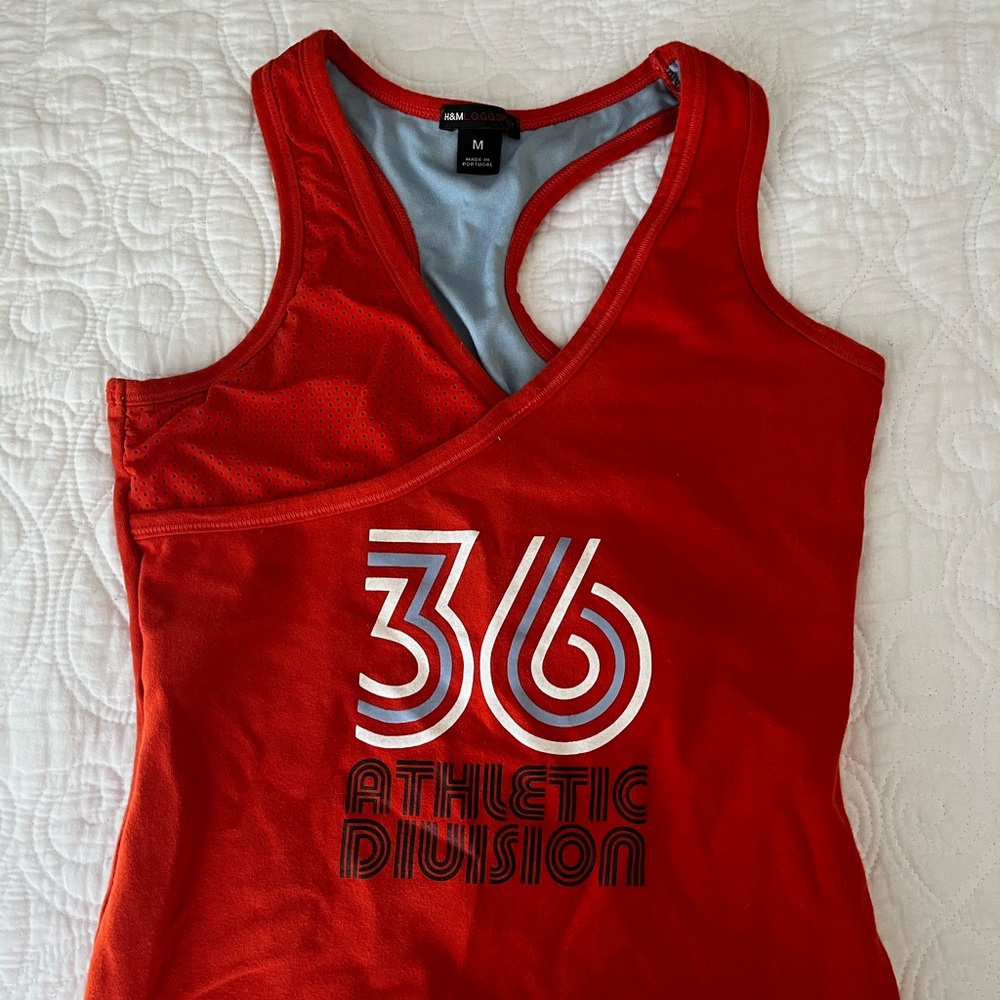 Orange workout top from H&M size M.